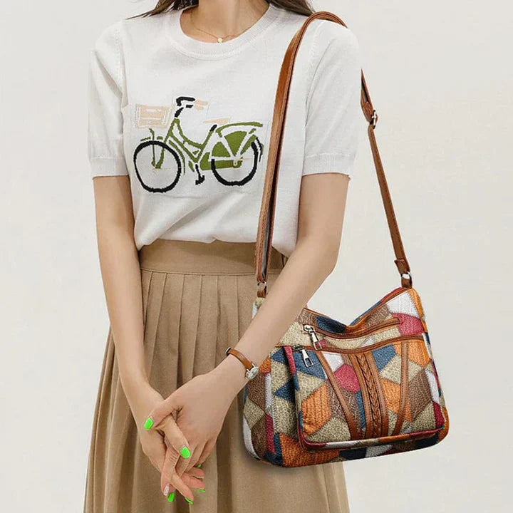 Bolso de mano de piel con mosaico
